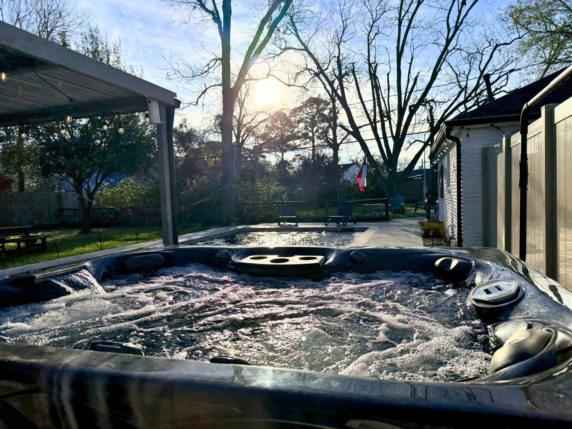 Hot tub and pool at night